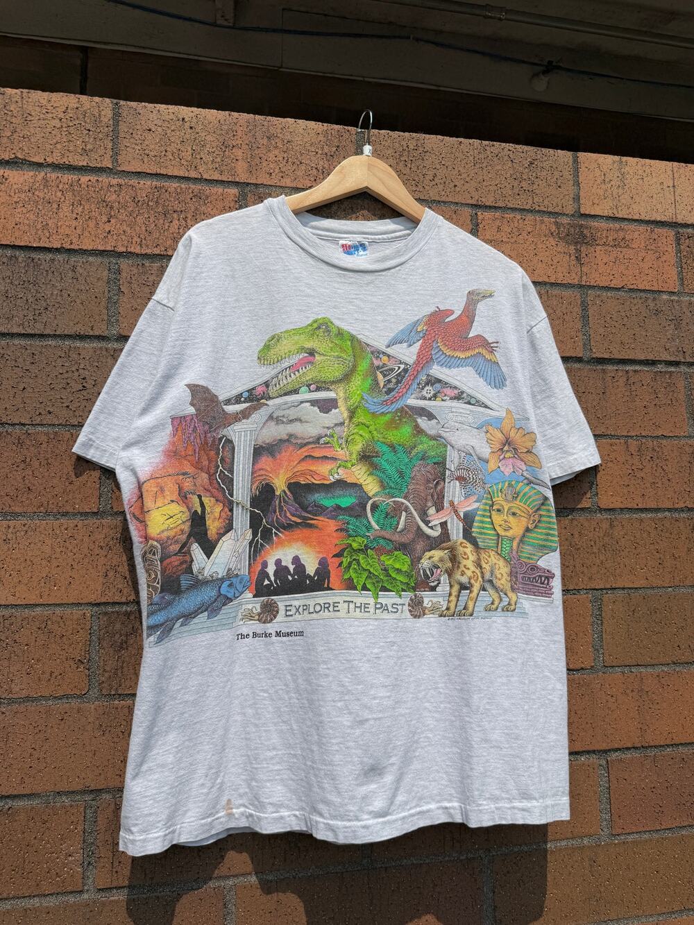 90s The Burke Museum Explore the Past Vintage All Over Print AOP Dinosaur Shirt